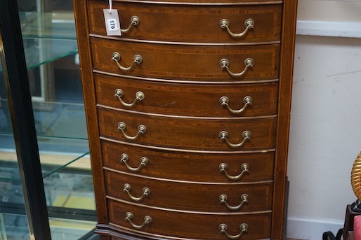 An Edwardian satinwood banded mahogany bowfront sheet music cabinet, width 61cm, depth 44cm, height 143cm